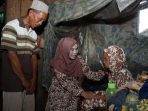 Bunda Winarni Serahkan Bantuan Bedah Rumah Hasil Swadaya DWP Lampung Selatan